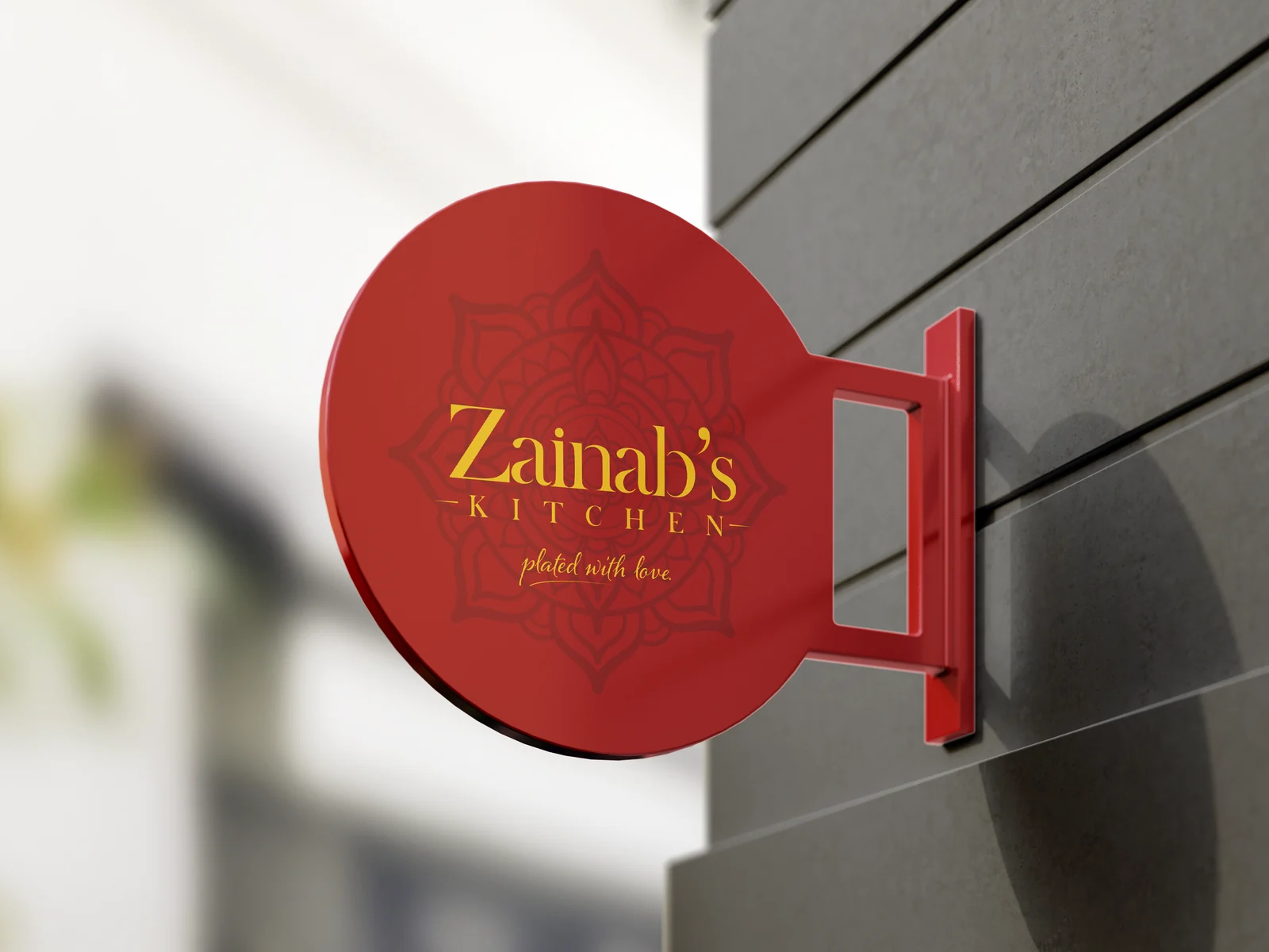 The red Zainab’s Kitchen shop sign