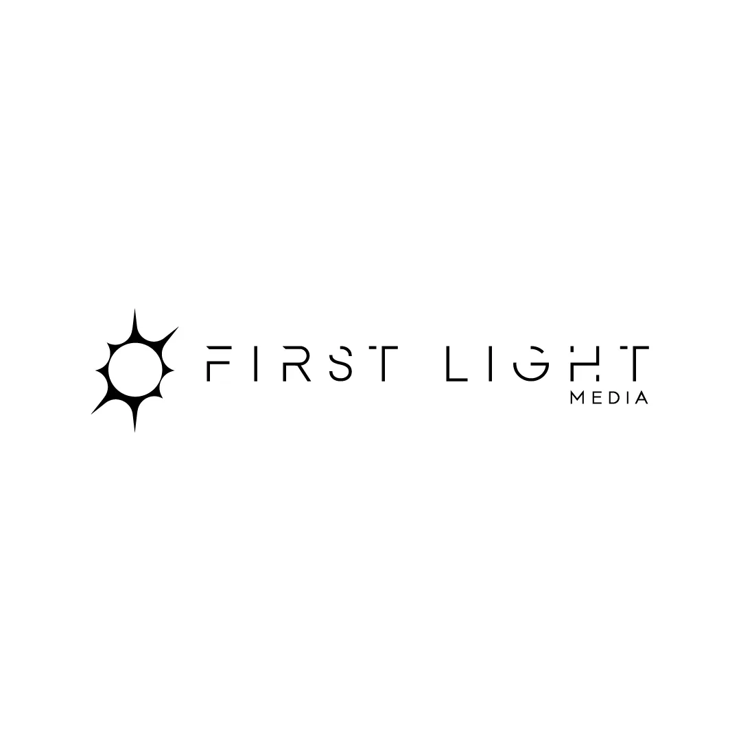 The First Light Media logo: a sun-burst symbol and a spaced wordmark