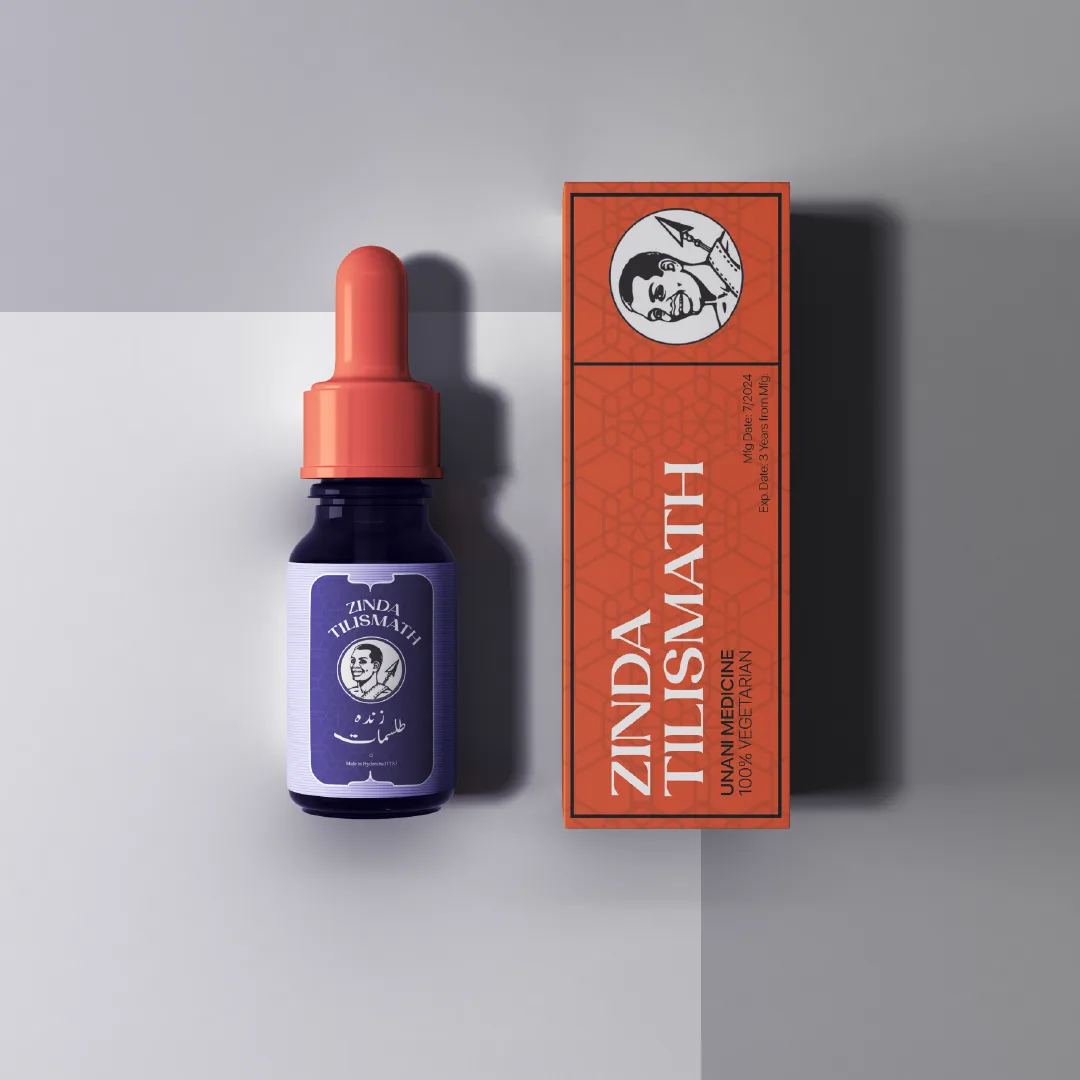 A purple Zinda Tilismath dropper bottle beside an orange patterned carton